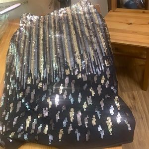 Sequin black and gold skirt. Never worn. Gorgeous with tags.